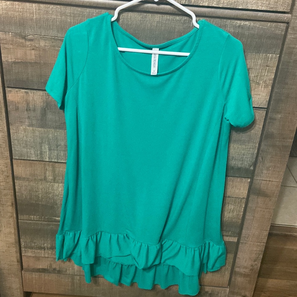 Green ruffle shirt